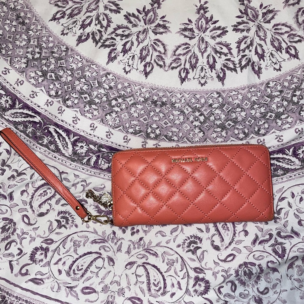 Coral colored Michael Kors wristlet